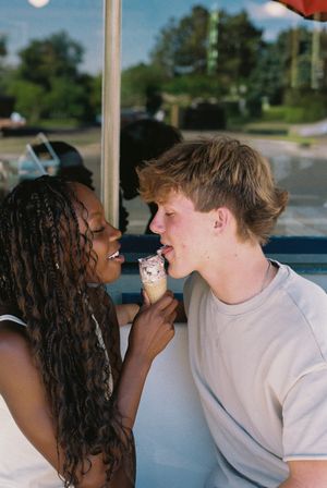 Couple eating ice cream for their engagement photoshoot in Southern Utah