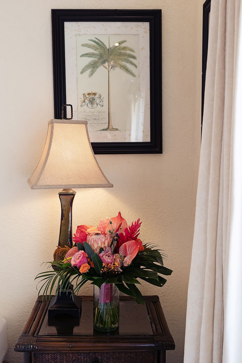 Elegant floral arrangement with tropical colors at Villa La Joya wedding.