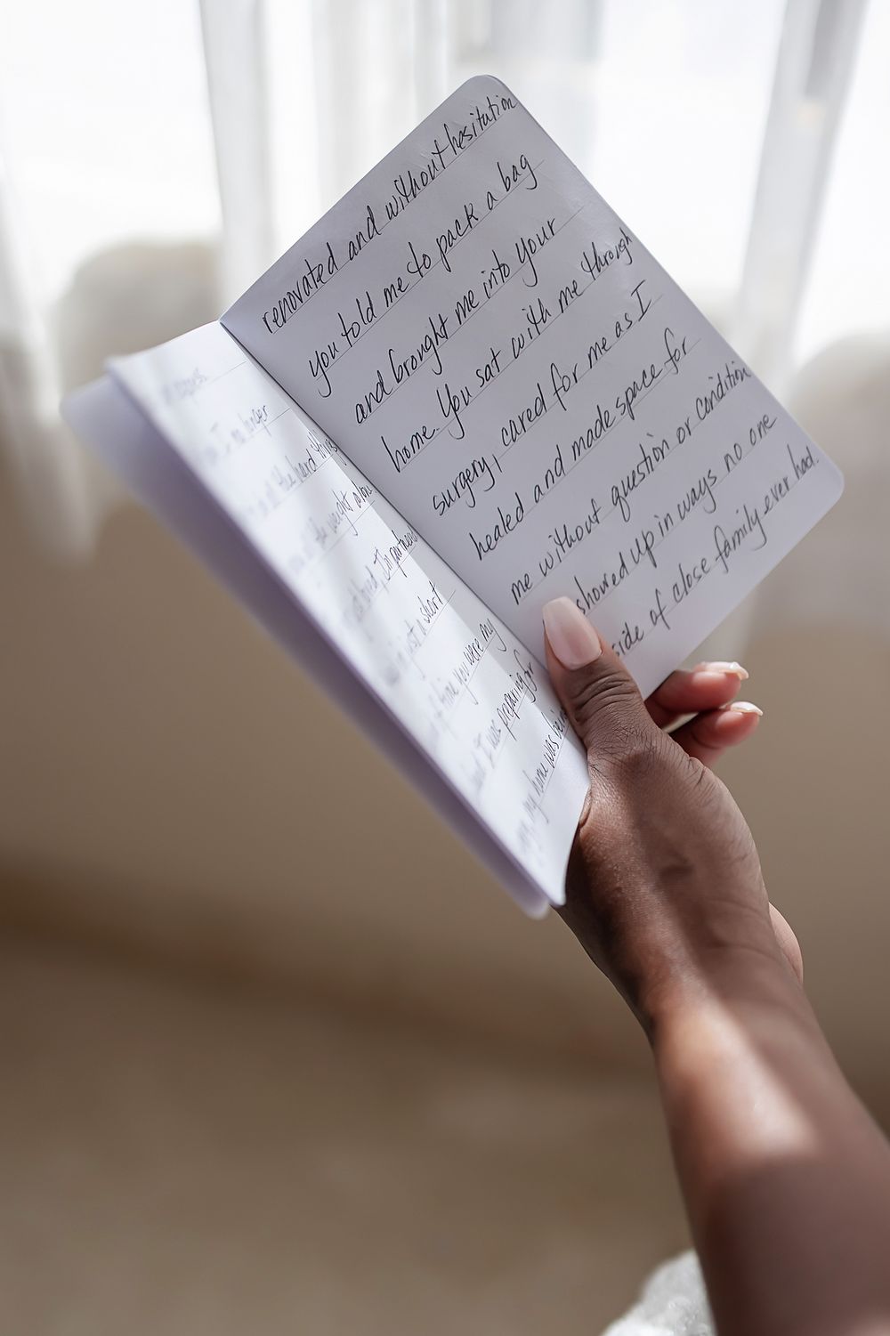 Close-up of handwritten wedding vows at Villa La Joya ceremony