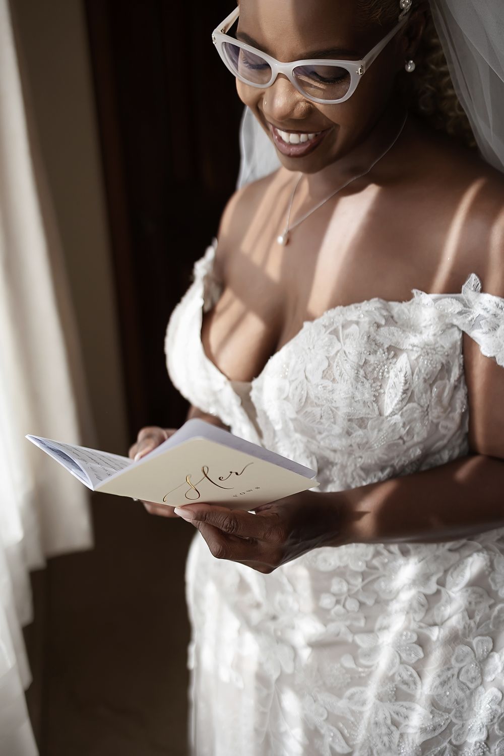 Bride Cherese reading her vows with emotion before the wedding.