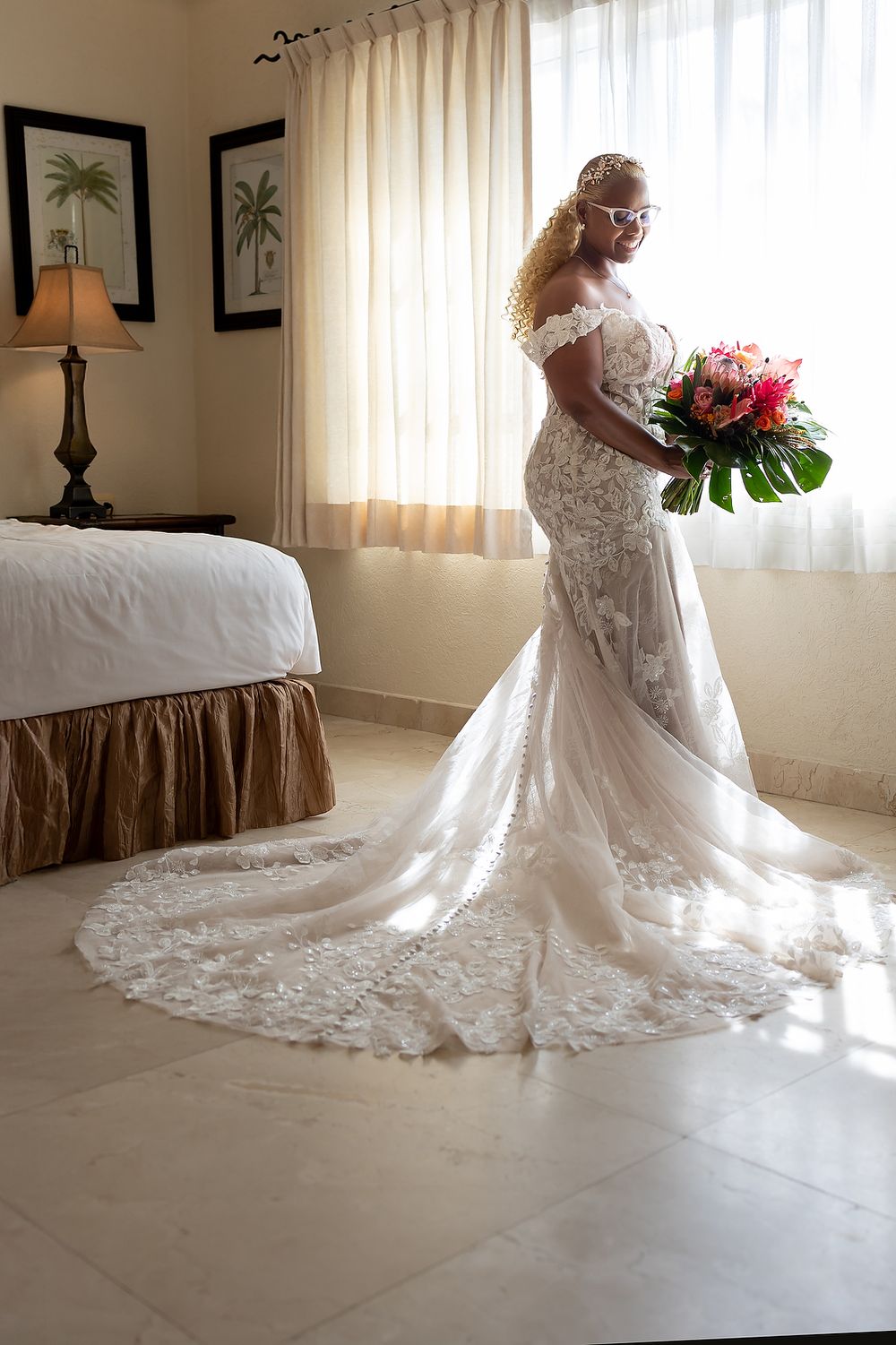 Bride Cherese smiling radiantly during wedding preparations.