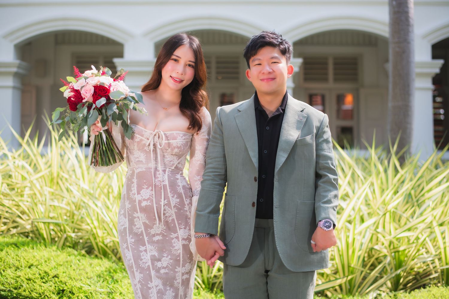 Romantic wedding photoshoot against the iconic Marina Bay Sands hotel in Singapore during sunset.