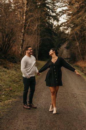 engagement session couple walking and holding hands engagement photographer