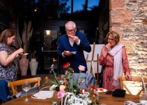 non-traditional wedding photographer in the Lake District - guest eating pizza
