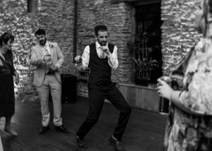 non-traditional wedding photographer in the Lake District - groom dancing