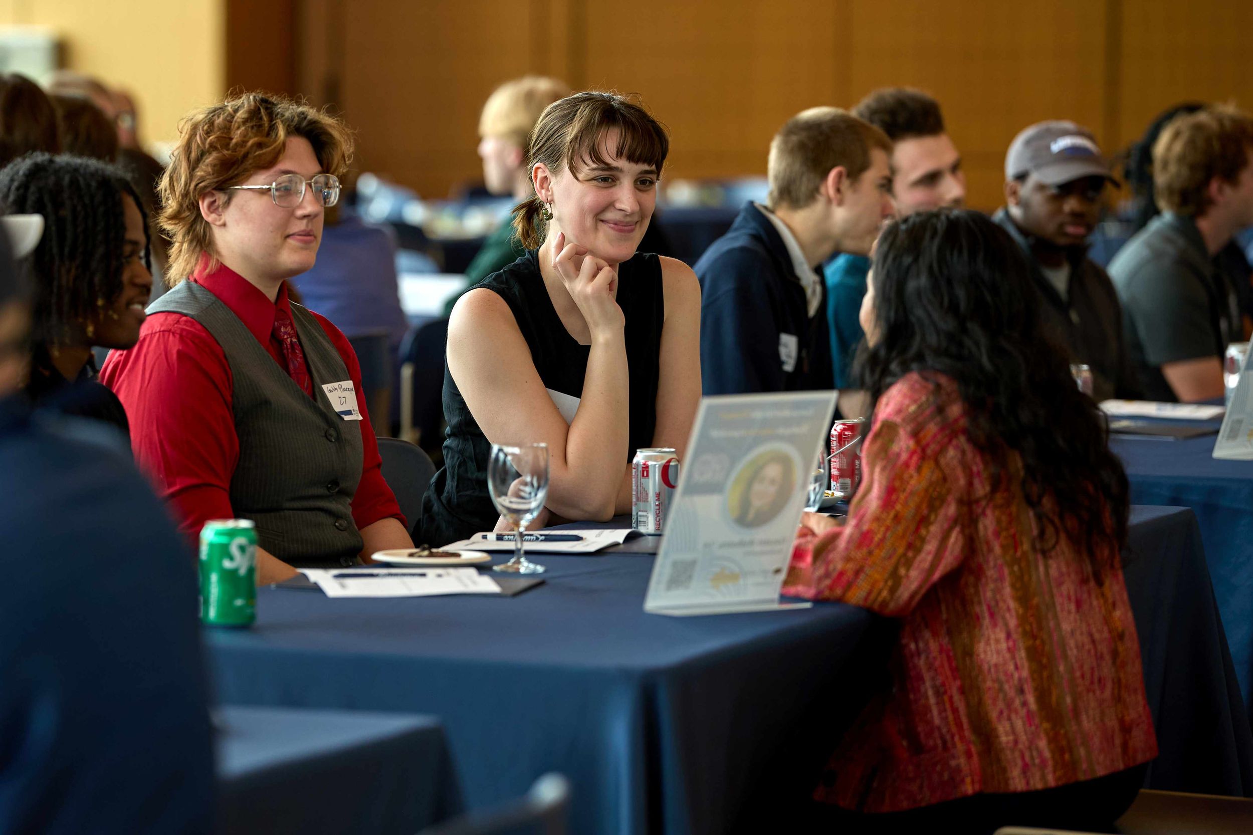 Students smile and talk during a speed networking event in Northeast Wisconsin.