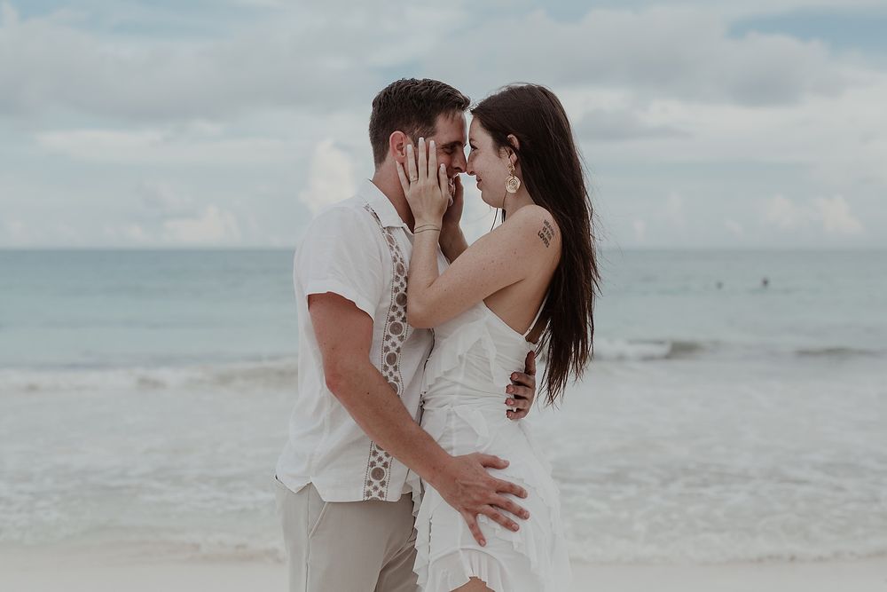 Emotional embrace during a destination engagement photoshoot in Riviera Maya.