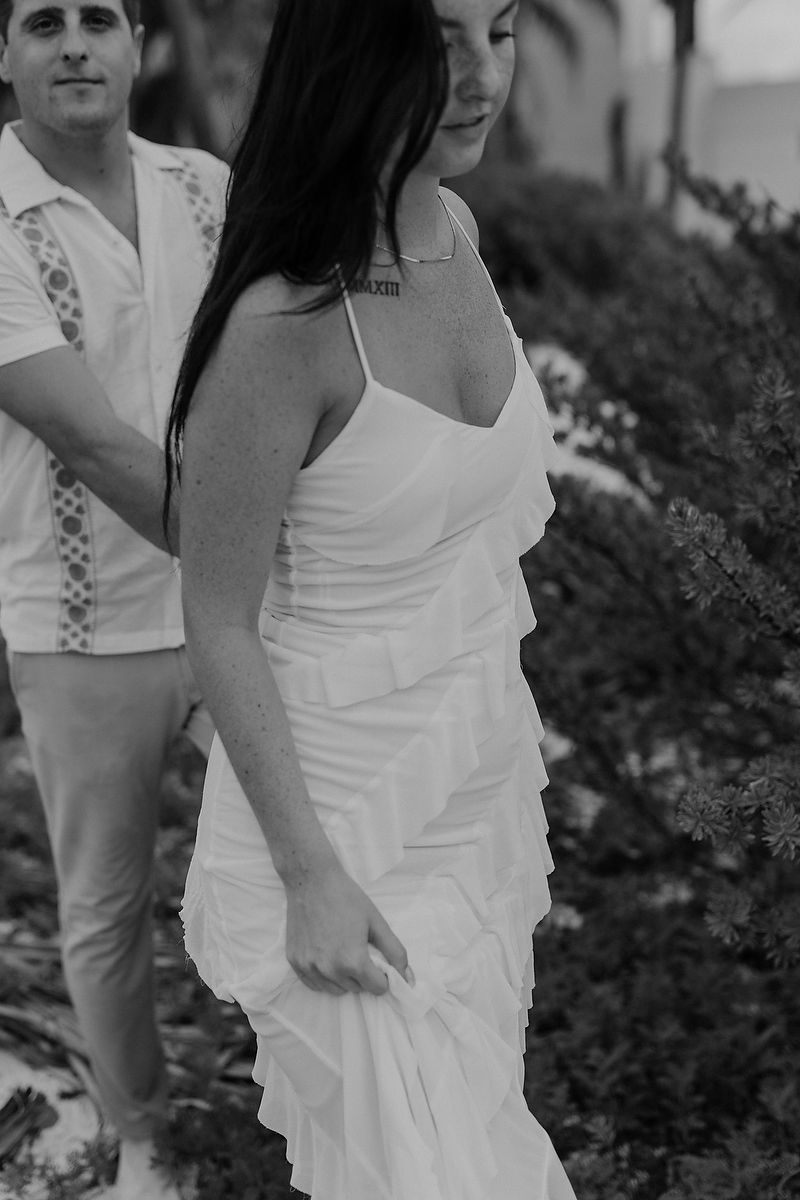 Black and white editorial engagement portrait in the Riviera Maya.