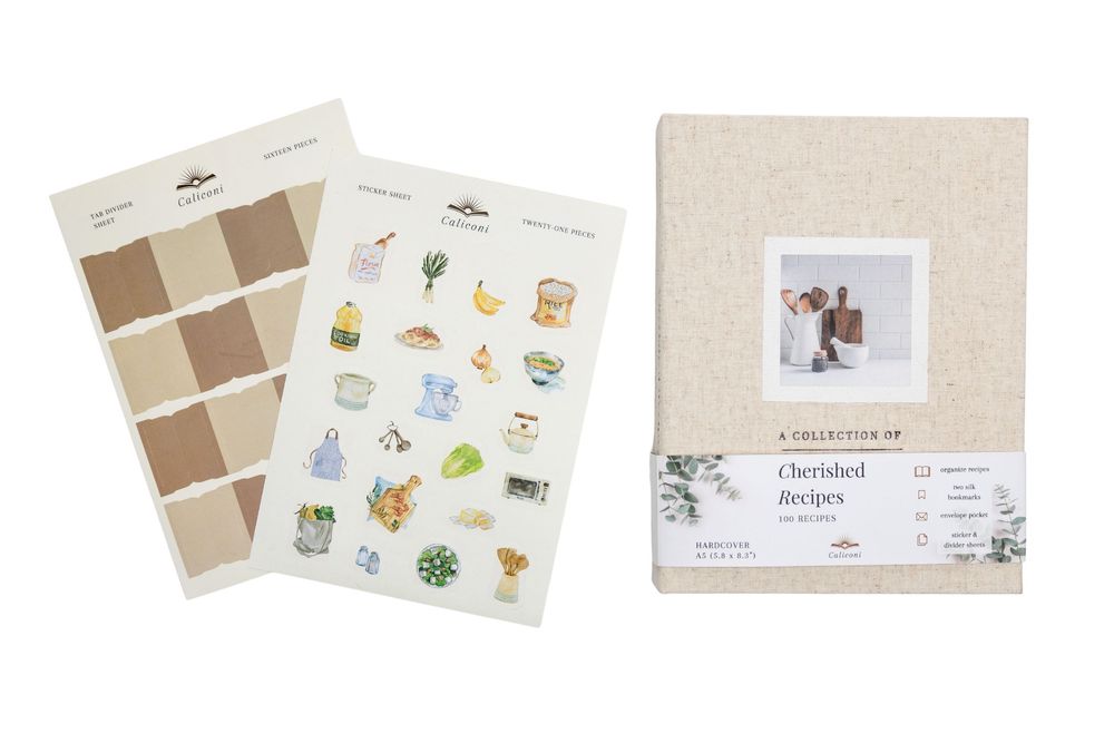 Cherished Recipes linen recipe book with decorative stickers and label sheets for organizing family recipes.