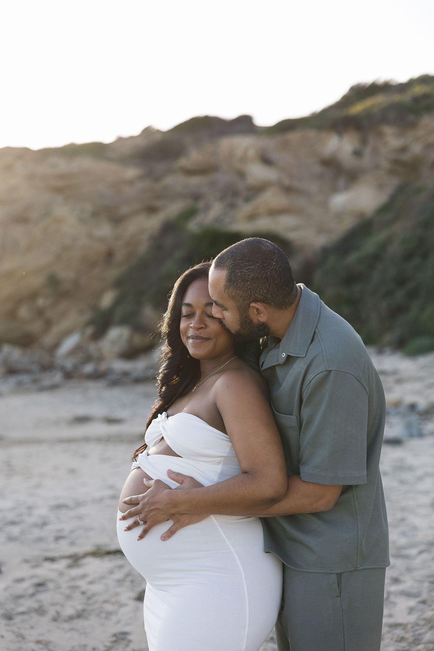 Outdoor Maternity Photography Ideas In LA with husband at the beach