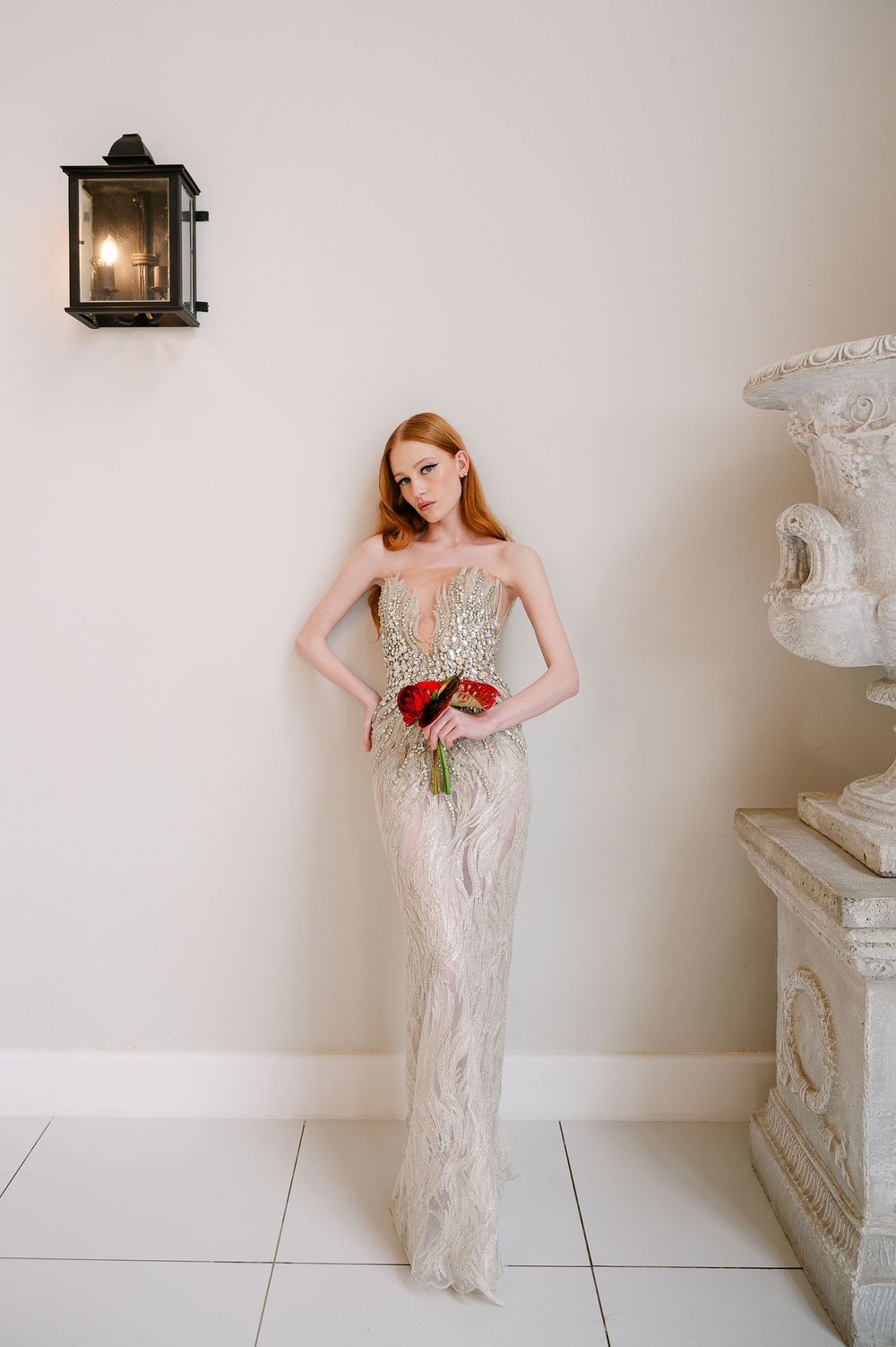 Romantic bridal session featuring a sparkly white gown and vintage-inspired decor with lantern accents.