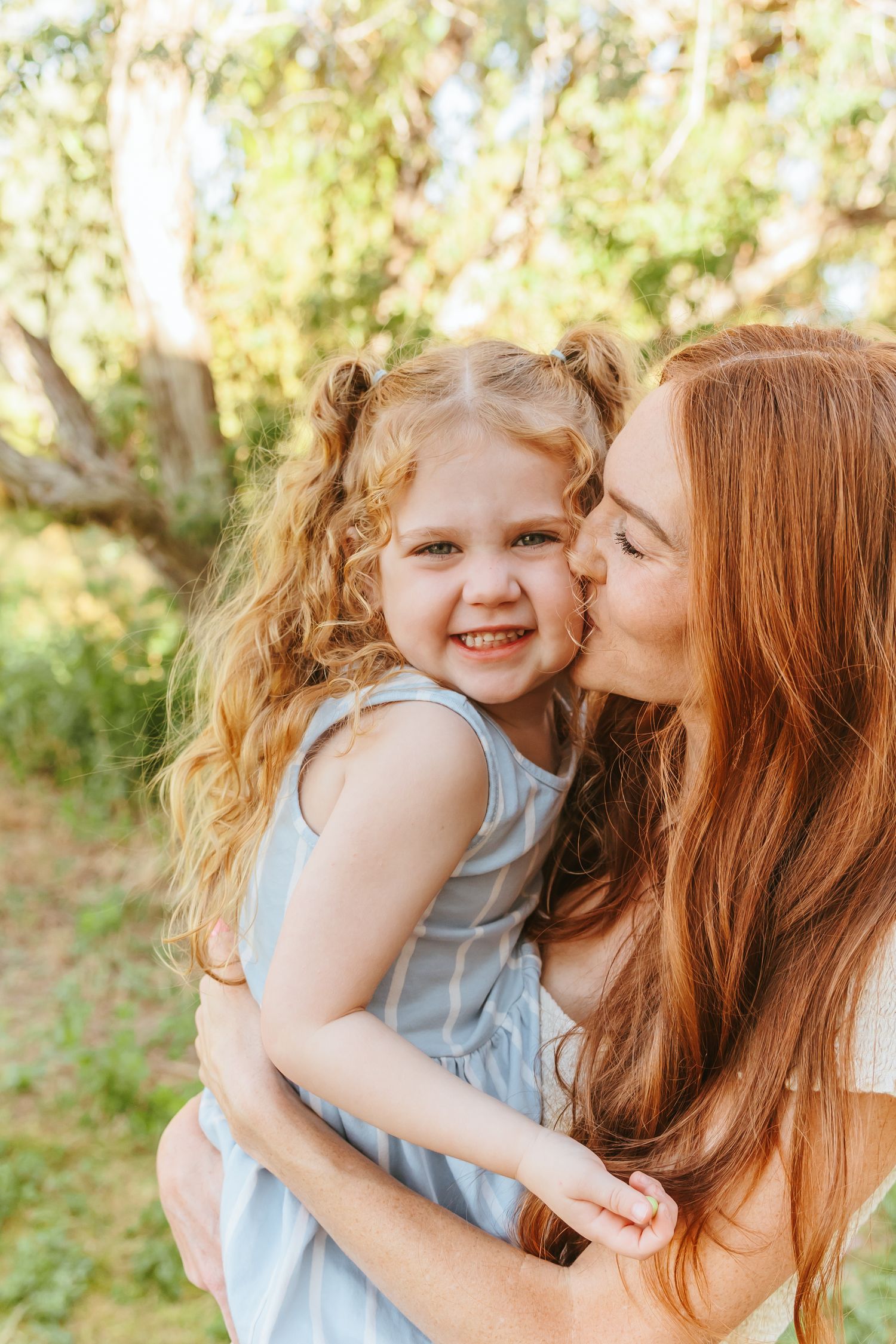 A tender moment captured outdoors with joyful expressions and natural lighting in a series of connected photos.