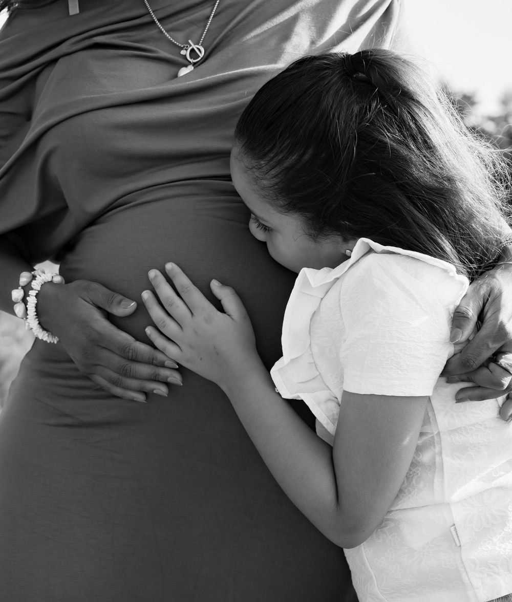 Black and white series showing tender moments between mother and child.