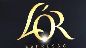 Gold metallic L'OR espresso logo design on black background.
