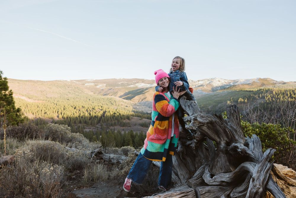 Hikers explore rugged mountain terrain during an autumn afternoon.