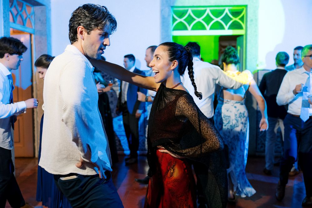 Wedding reception party inside Quinta do Torneiro in Portugal with guests dancing