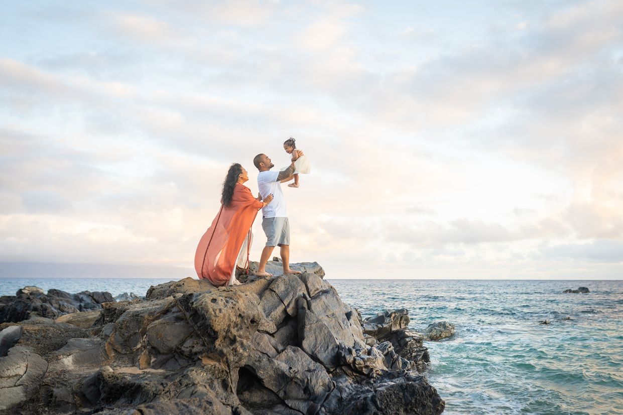 Maui family photographer photo against beautiful Maui sunrise beach by ohwowfotos.