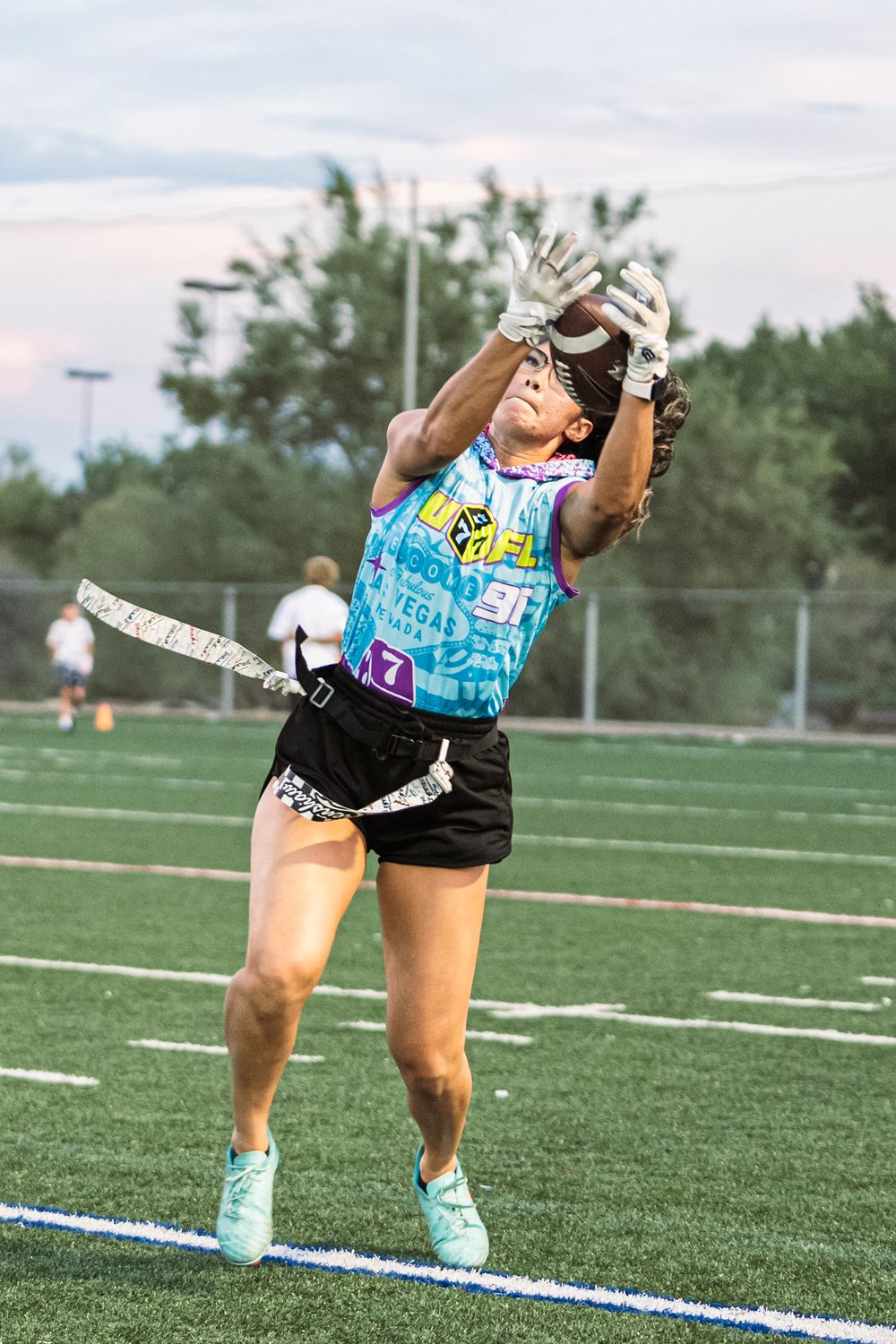 Flag Football Player catching a pass