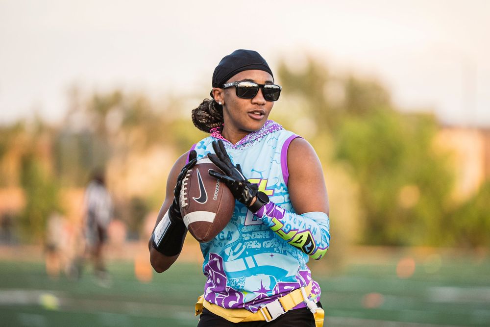 Flag Football Player about to throw a football
