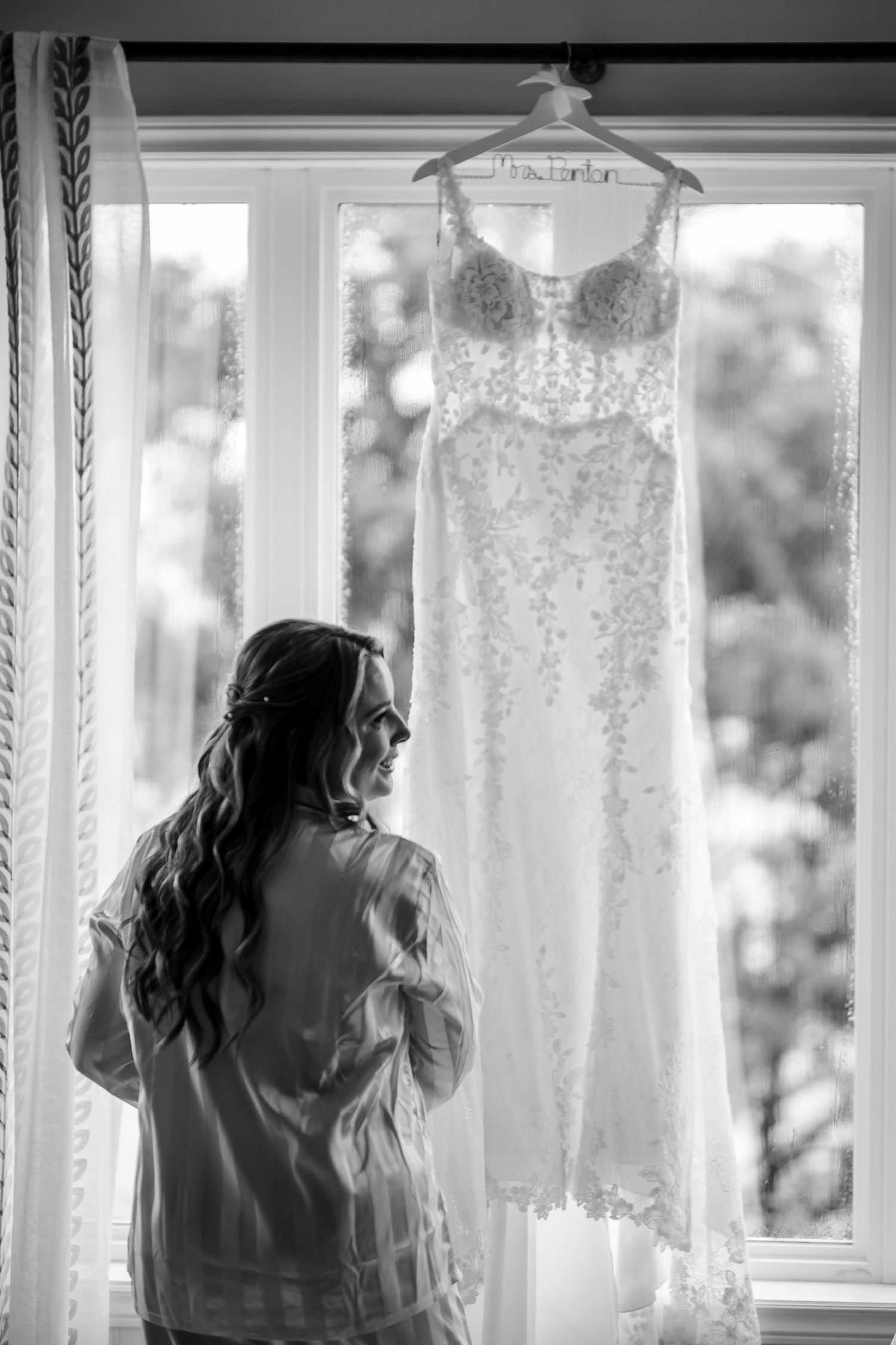 Black and white photo sequence of a woman in white standing near curtained windows creating a dreamy atmosphere.