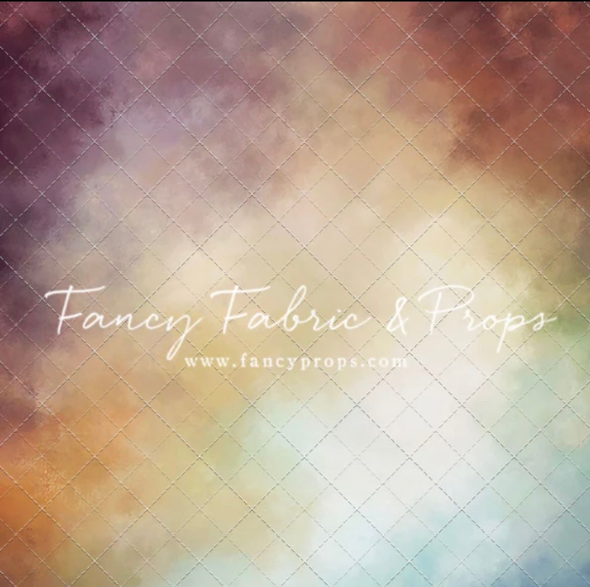 Abstract blurred background with soft gradient colors in pink, blue and orange tones forming an ethereal texture.