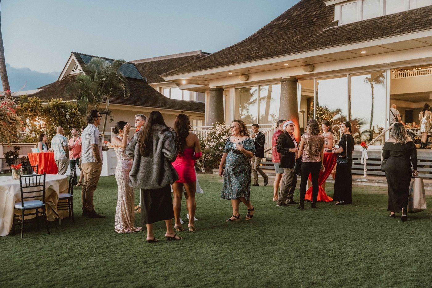 MWEA celebration at Sugar Beach venue with guests gathered on a lawn overlooking the ocean on Maui, Hawaii