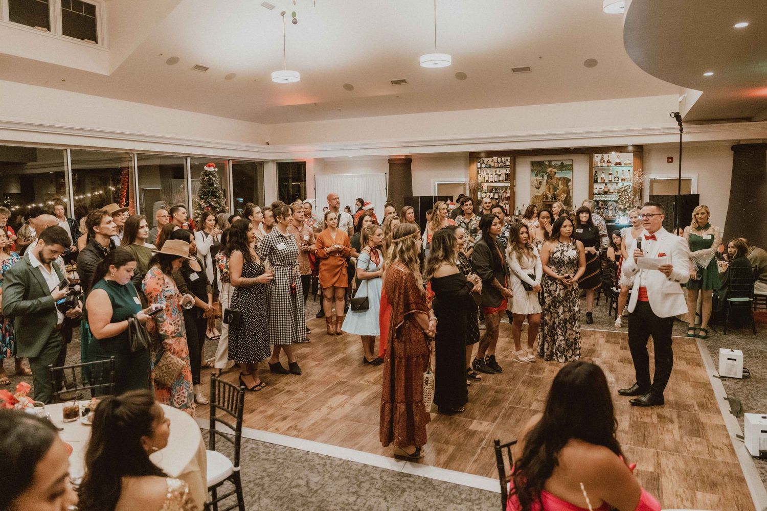 MWEA celebration at Sugar Beach guests dancing and celebrating in an indoor reception venue on Maui, Hawaii