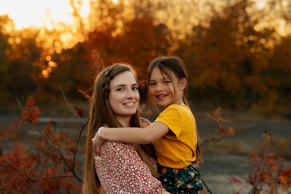 A series of seven outdoor portrait photos at golden hour with fall foliage and warm backlighting.