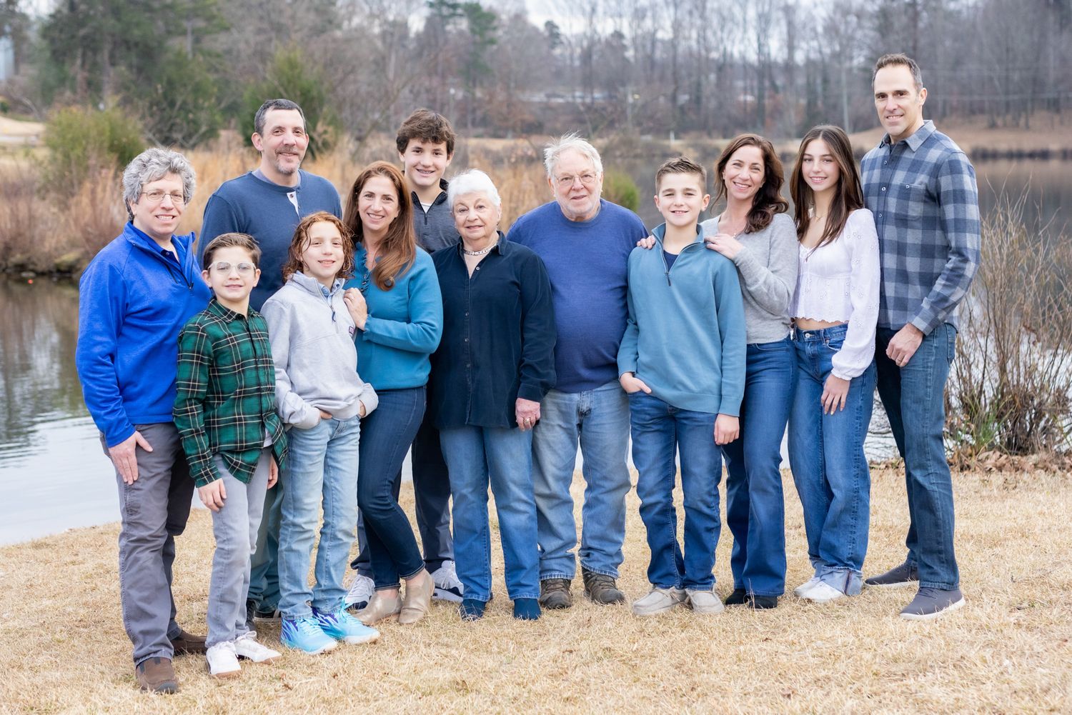 Smiling family photo together in Essex County park