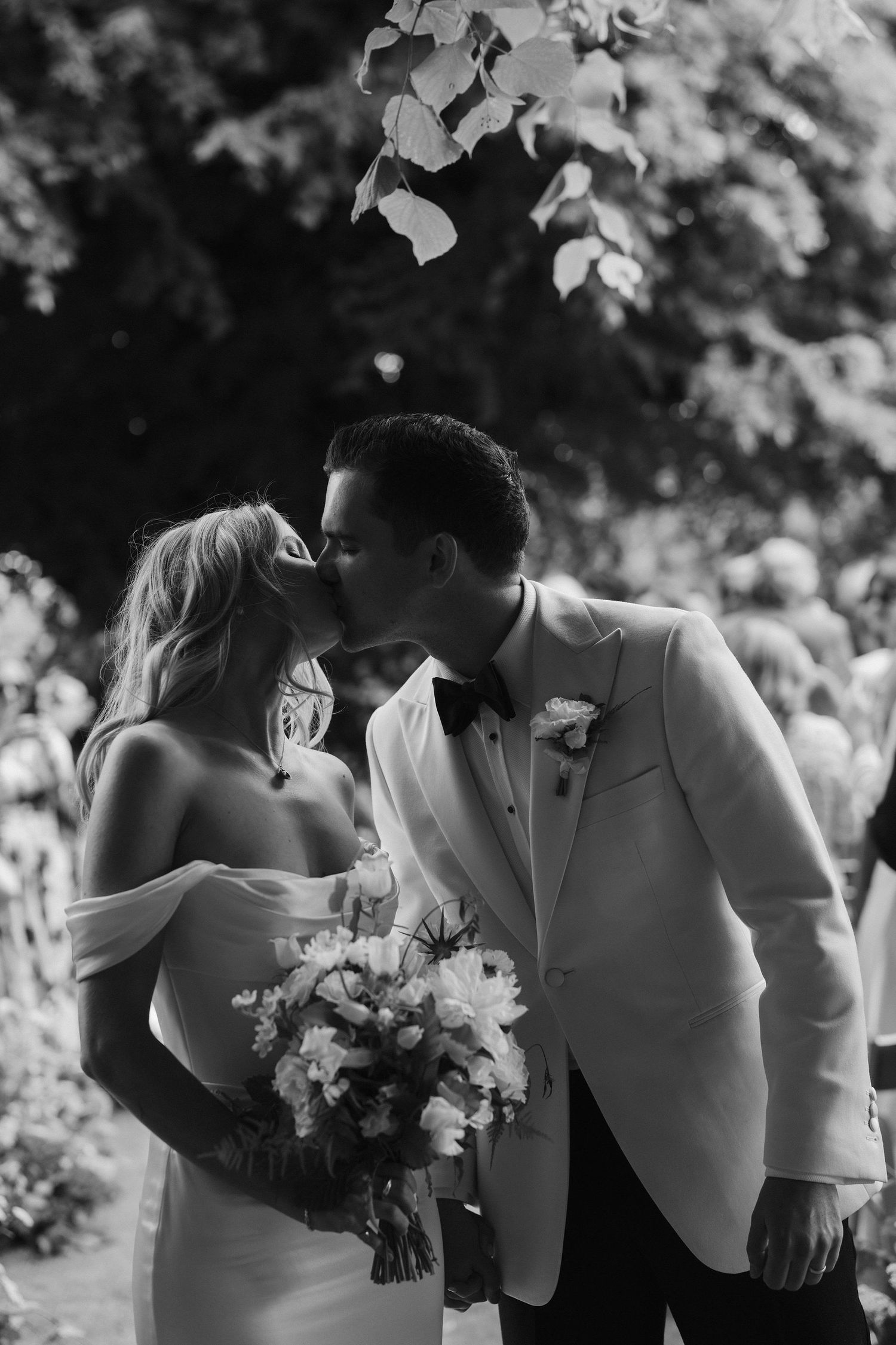 bride and groom kissing during ceremony at Hamswell house in bath