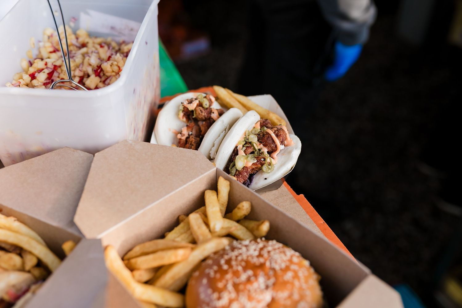 Wedding reception food featuring burgers and french fries in takeout boxes. Photographer. Hull. East Yorkshire. Photography