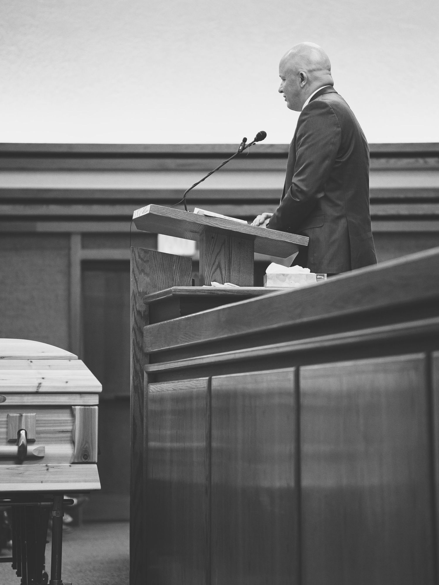 A man shares stories at the pulpit