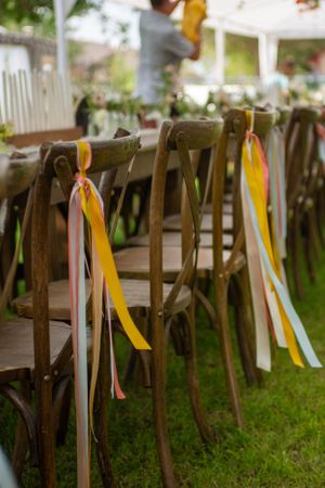 Reception chairs on wedding day at a backyard wedding in Rexburg, Idaho.