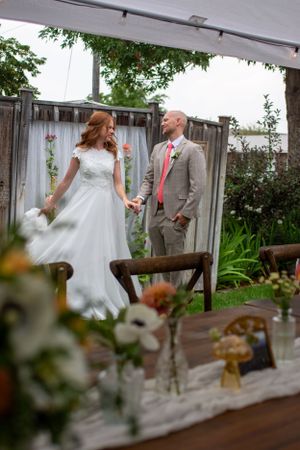 Bride and groom dancing on wedding day at their backyard wedding in Rexburg, Idaho.