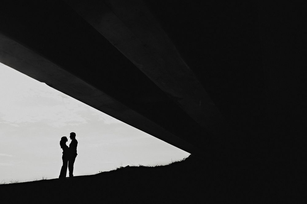 Artistic shot of the couple's shadows, creating a unique perspective of their love during a pre-wedding shoot