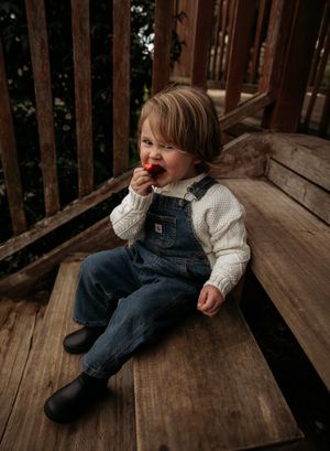 Toddler sitting on steps taken in Western Sydney location