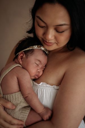 Newborn and mother taken in Penrith newborn studio