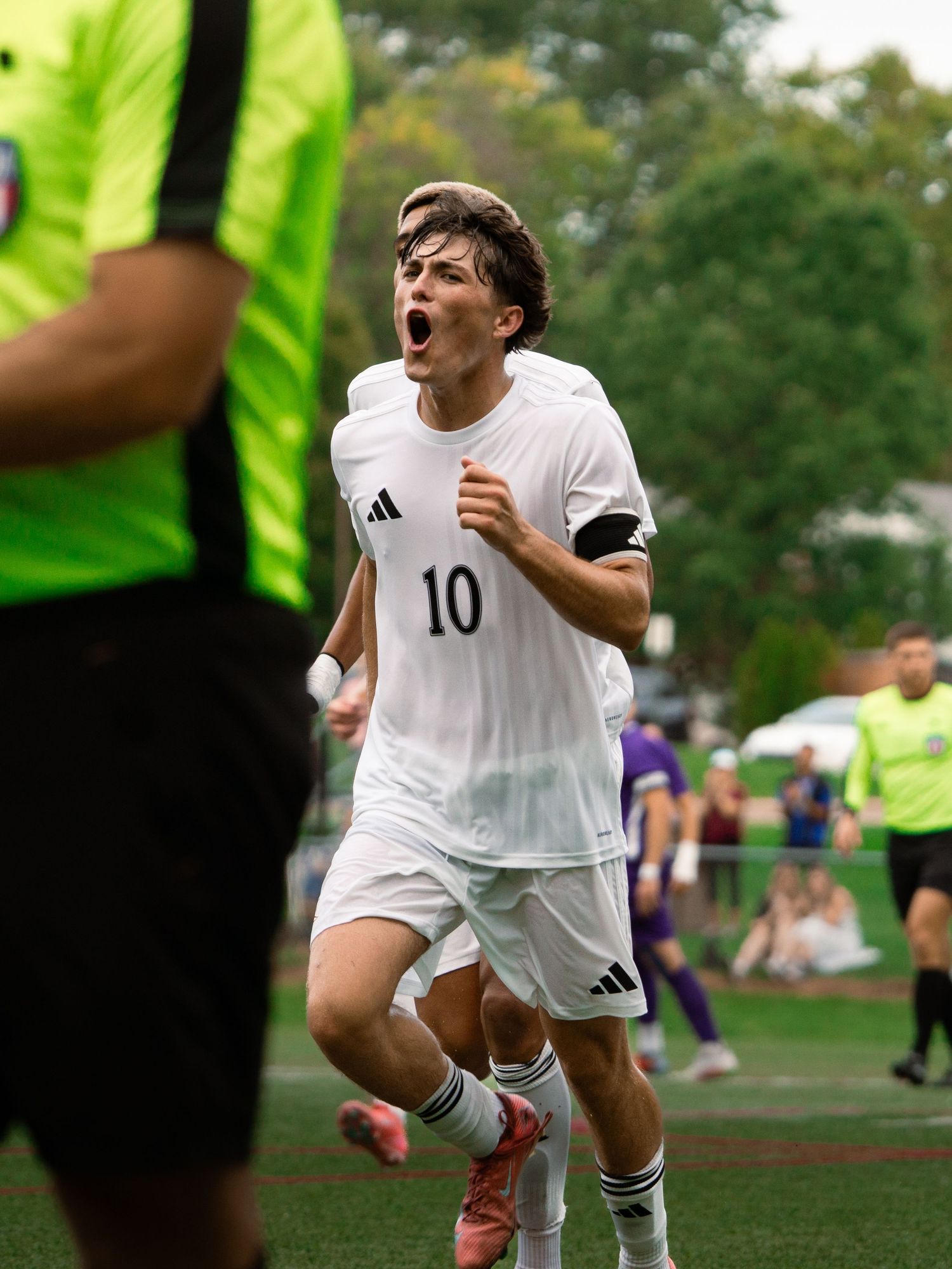 Fikret Hasovic celebrating a penalty kick goal, Aquinas vs Taylor, Aquinas College Athletic Field, Grand Rapids MI, 9/13/25
