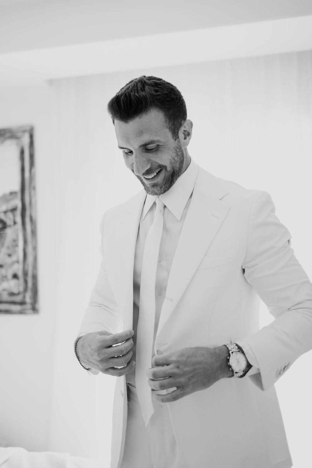 Groom getting ready for his destination wedding in Italy
