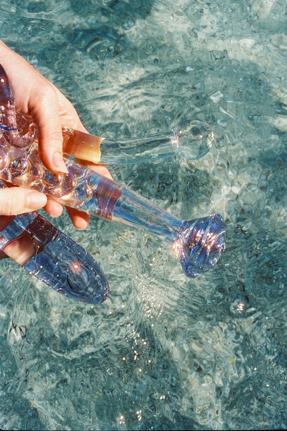 Artistic film photography of Yoni Pleasure Palace’s crystal pleasure products, styled in natural light in Perth