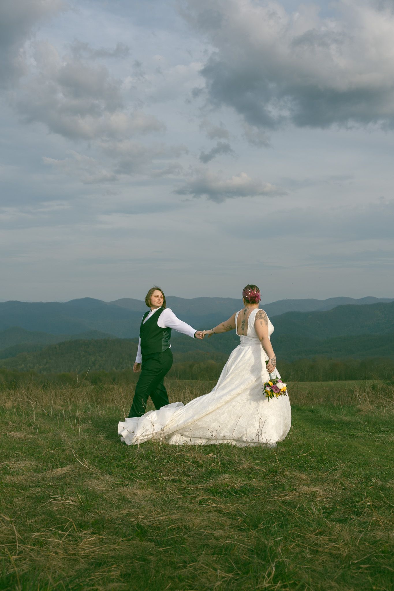 lesbian wedding mountain elopement asheville nc bride suit photography romantic moody queer lgbtq