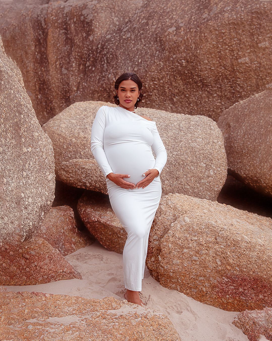 Capturing maternity photo shoot on Llandudno beach,Sunset Maternity photo shoot, Maternity photographer. Maternity photoshoot in Cape Town.