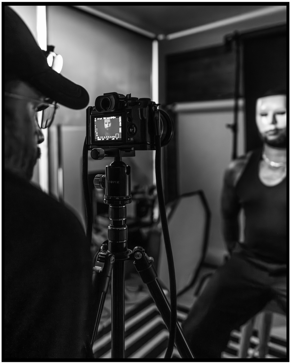 Black and white behind-the-scenes photo of camera setup during studio shoot. Portland music photographer