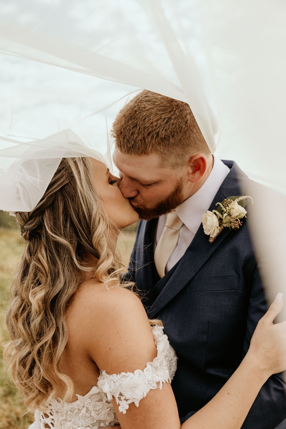 Photograph of bride and groom a Wild Daisy Farm in Molena, Georgia.