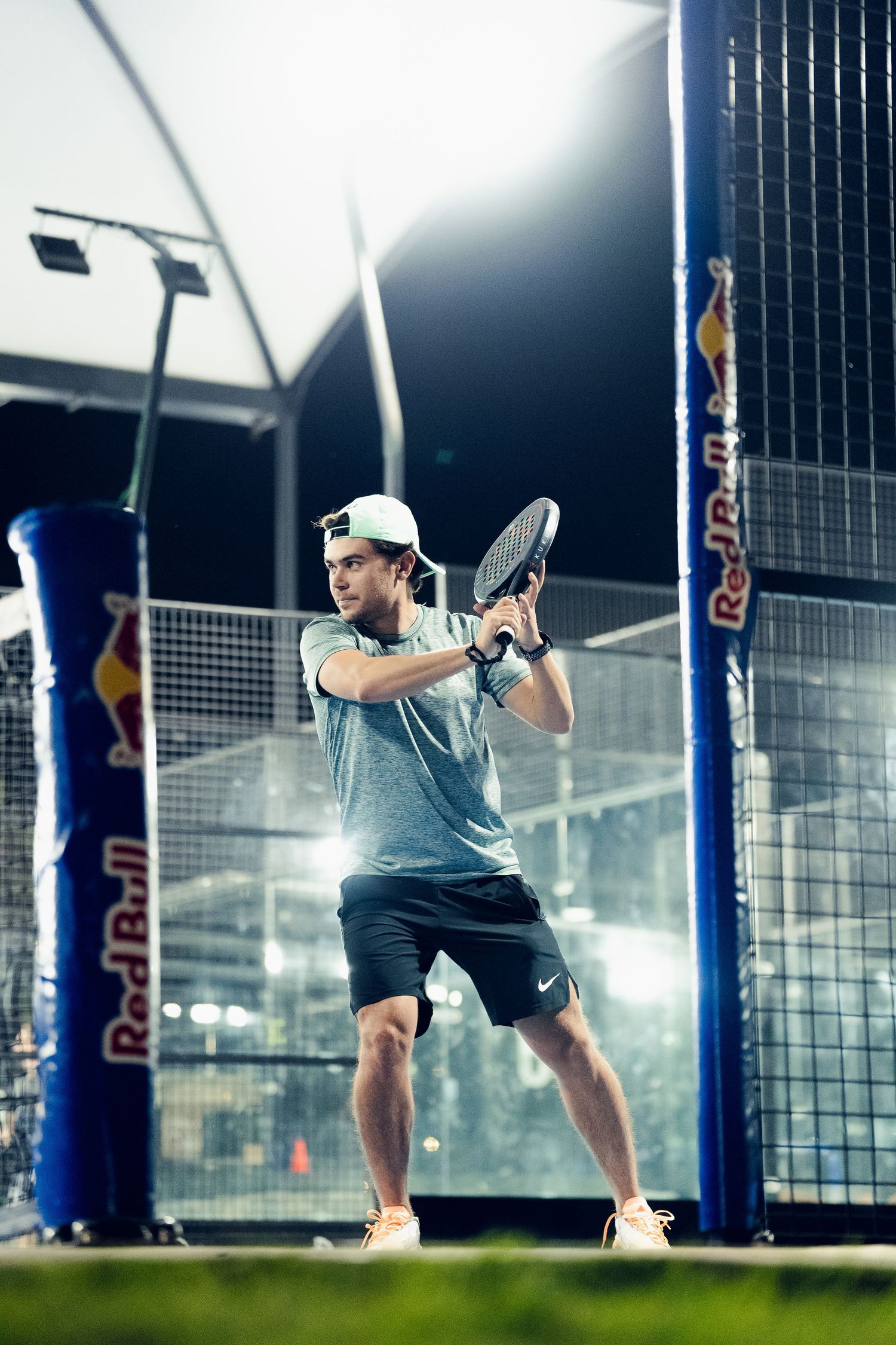 Dynamic action shots of tennis players practicing serves on illuminated courts.