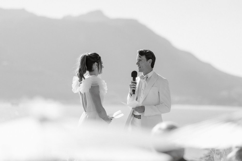 A couple exchanges vows during their mountaintop wedding ceremony.