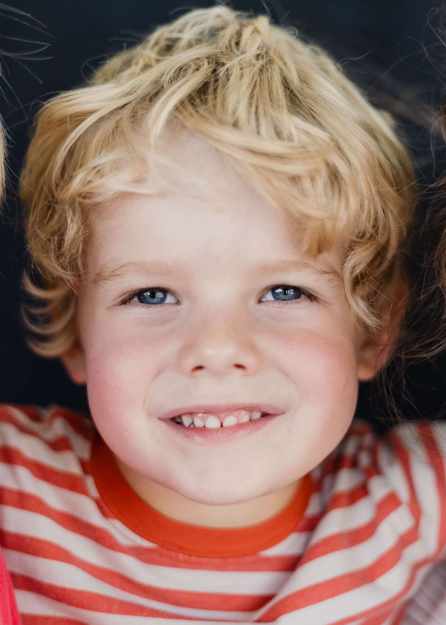 Curious boy during a sensory-sensitive school photography session in Melbourne.