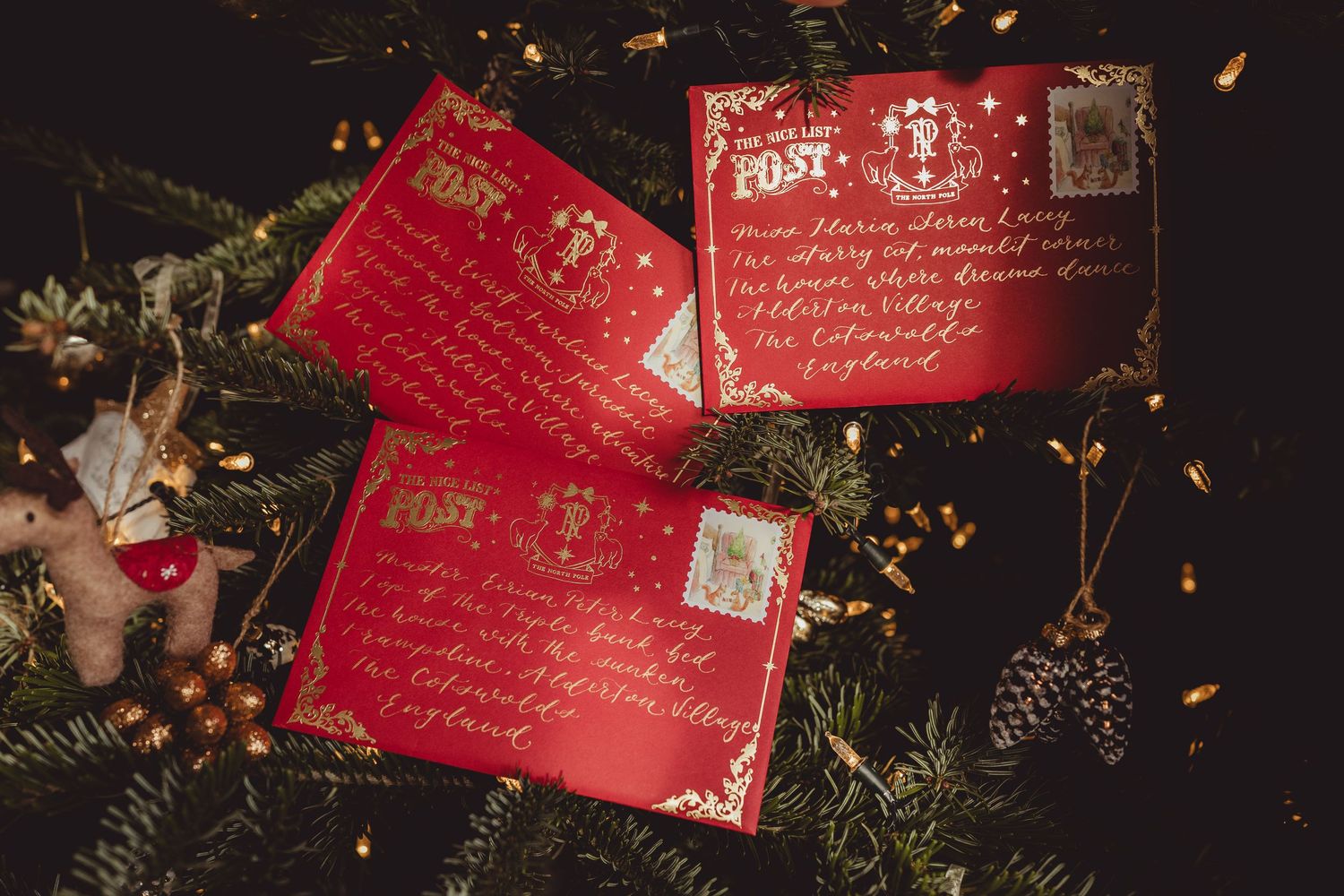 A collage of festive Christmas decorations and ornaments with twinkling lights and holiday decor in warm golden tones.