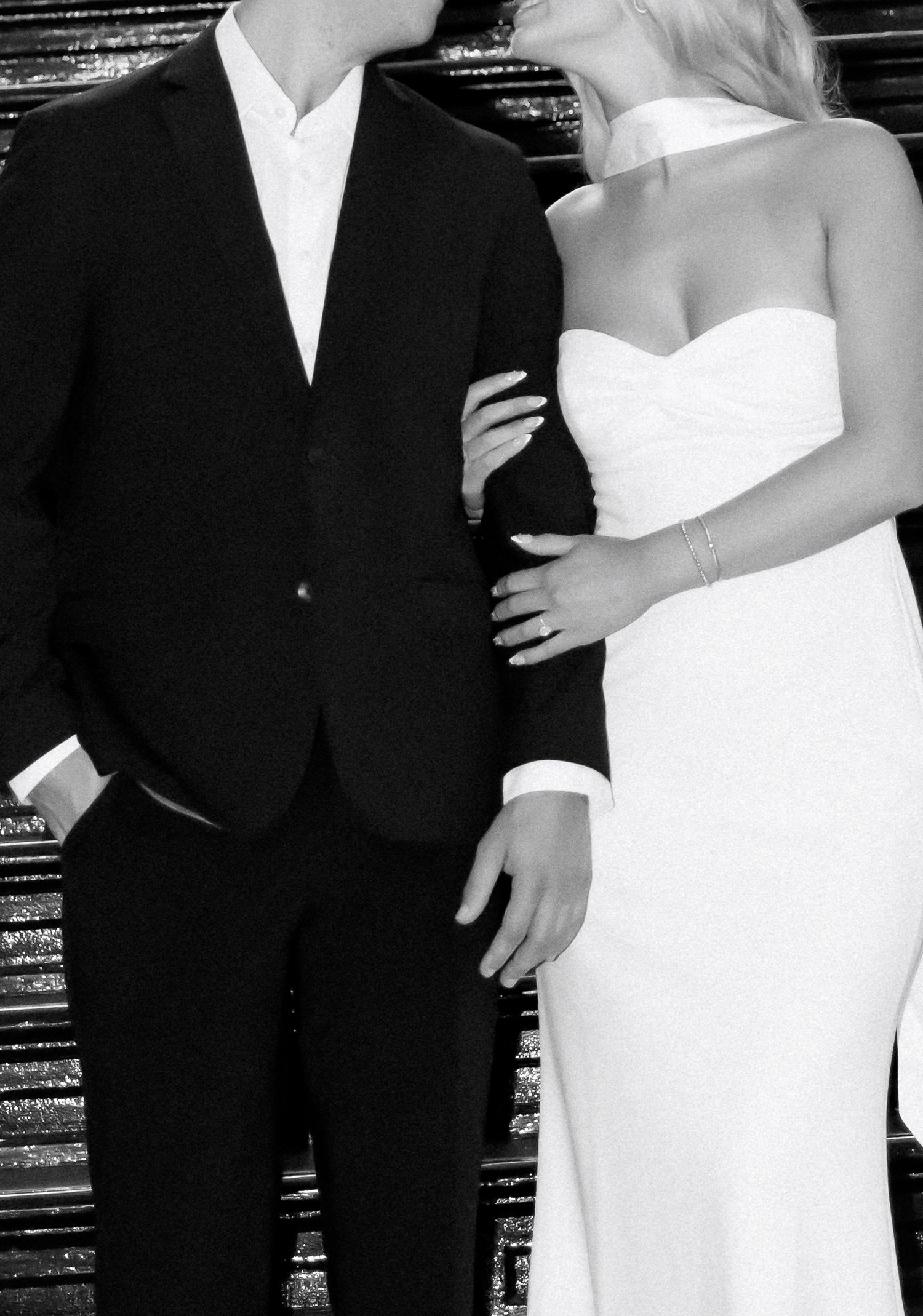 Close-up shots of couple in formal black and white attire.