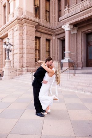 Dancing poses captured in sequence outside government building.